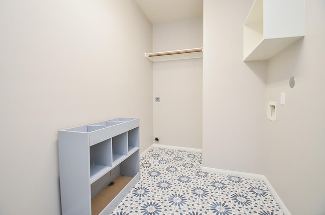 clothes washing area featuring electric dryer hookup