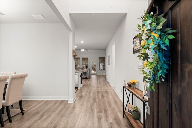 foyer with light hardwood / wood-style flooring