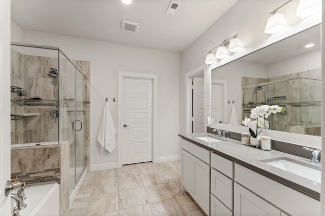 bathroom featuring vanity and a shower with shower door