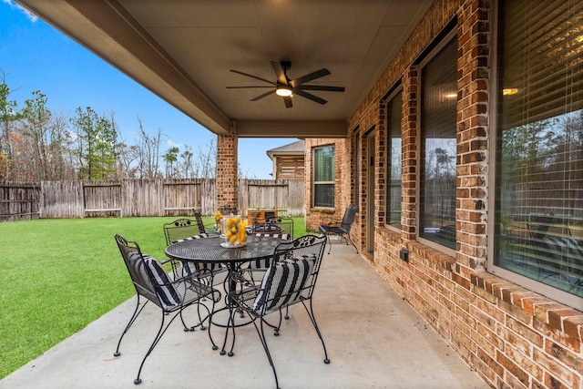 view of patio / terrace featuring ceiling fan