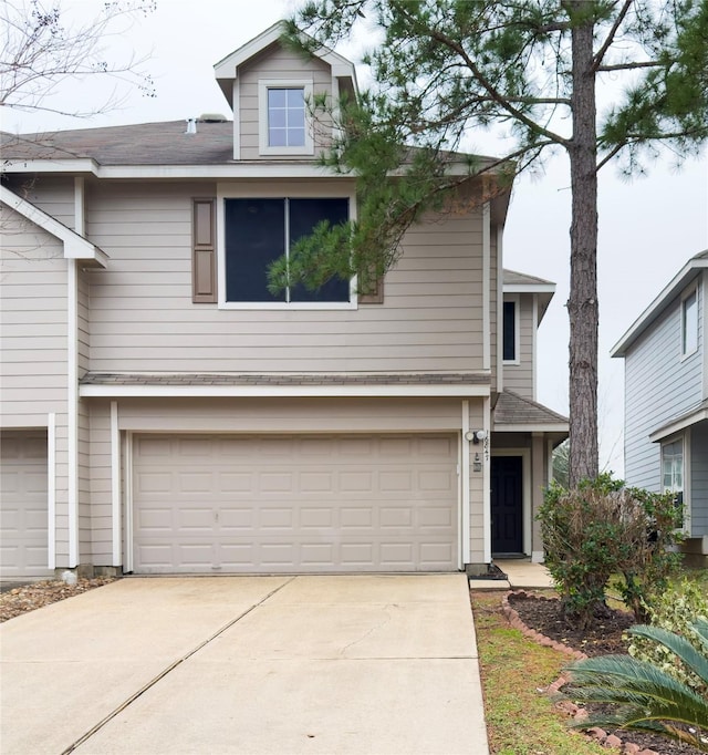 front of property featuring a garage