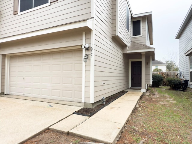 property entrance featuring a garage