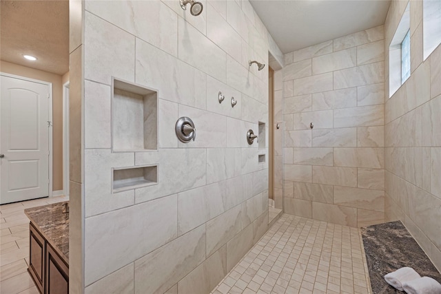 full bath featuring recessed lighting and tiled shower