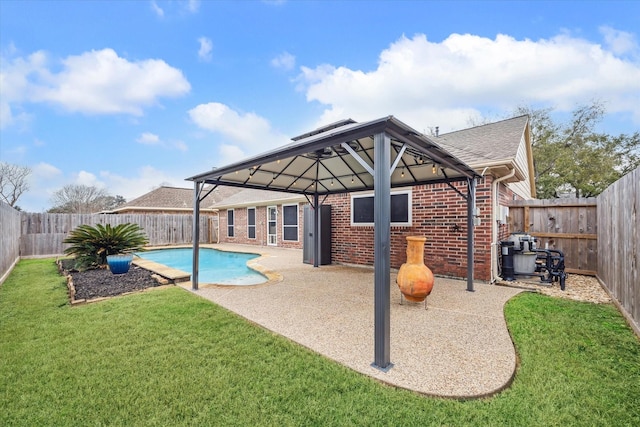 view of pool featuring a yard, a gazebo, and a patio area