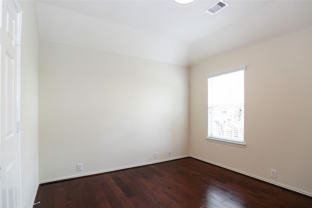 empty room featuring hardwood / wood-style floors