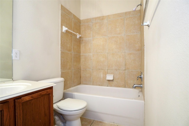 full bathroom with vanity, tiled shower / bath combo, tile patterned floors, and toilet