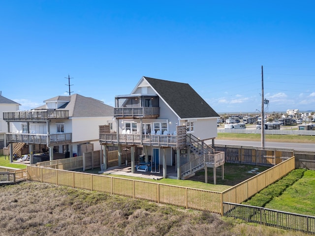 rear view of house featuring a patio area