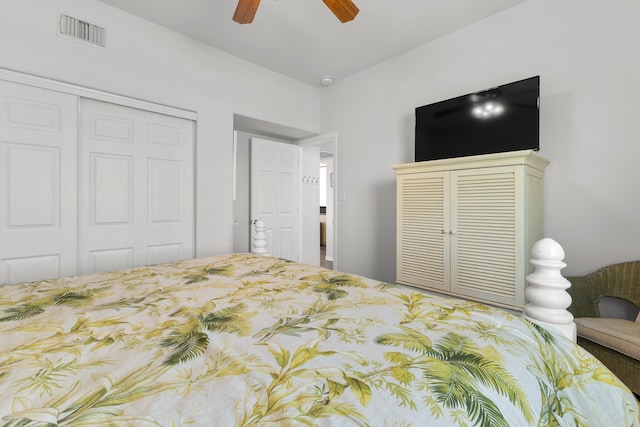 bedroom featuring ceiling fan and a closet