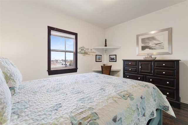 bedroom featuring dark wood-type flooring