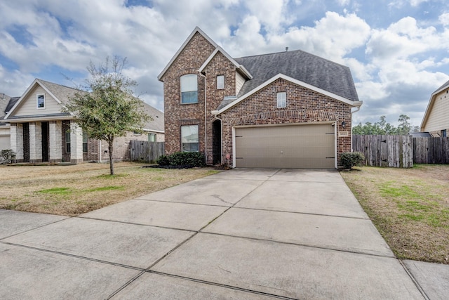 front facade with a garage and a front yard