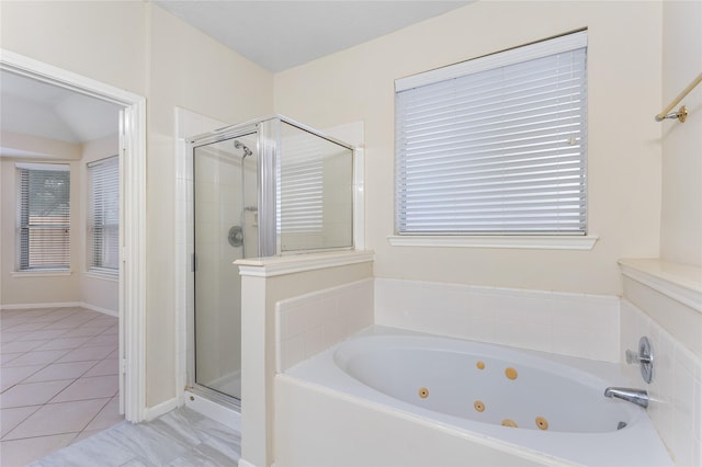 bathroom with tile patterned flooring and plus walk in shower