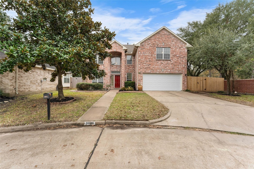 20015 Barton Creek Ct, Katy, TX 77450 - front facade with a garage