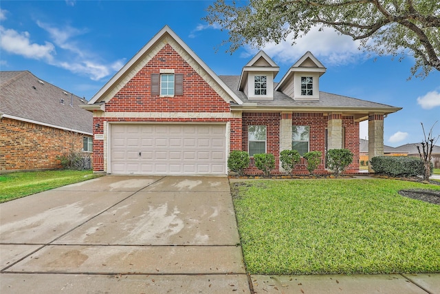 12023 Summer Range Dr, Humble, TX 77346 - view of front facade with brick siding, concrete driveway, a front yard, and roof with shingles