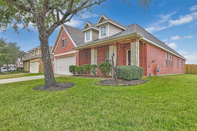 view of front of house with a garage and a front yard