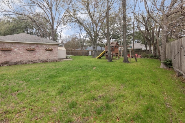 view of yard featuring a playground