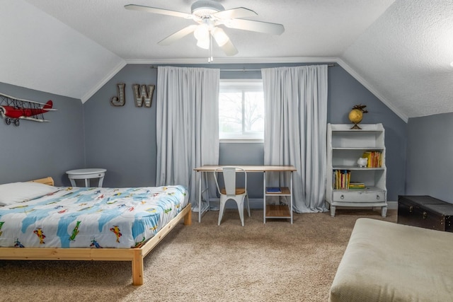 carpeted bedroom featuring lofted ceiling, ceiling fan, and a textured ceiling