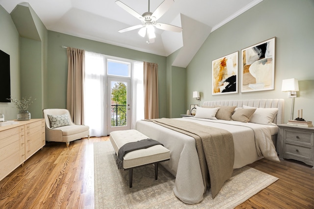 bedroom featuring wood-type flooring, lofted ceiling, ornamental molding, access to outside, and ceiling fan