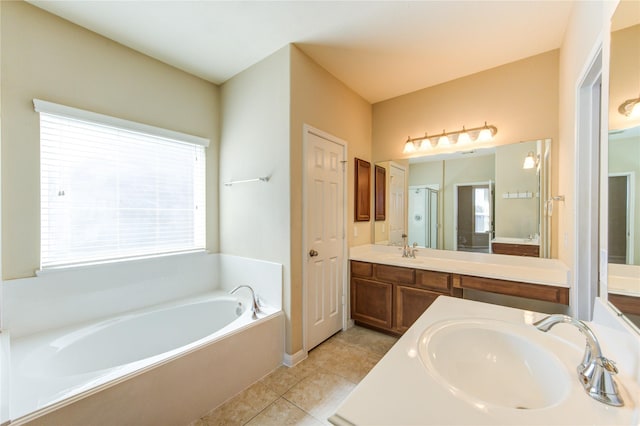 bathroom with vanity, tile patterned floors, and shower with separate bathtub