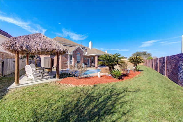 exterior space featuring a gazebo, a yard, and a patio area