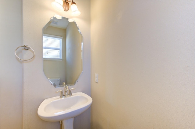 bathroom with sink and toilet