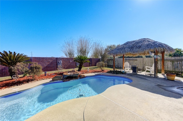 view of pool featuring a gazebo and a patio area