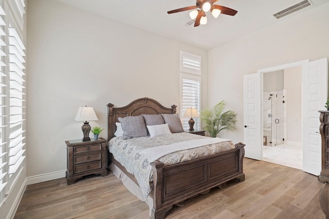 bedroom with light hardwood / wood-style floors and ceiling fan