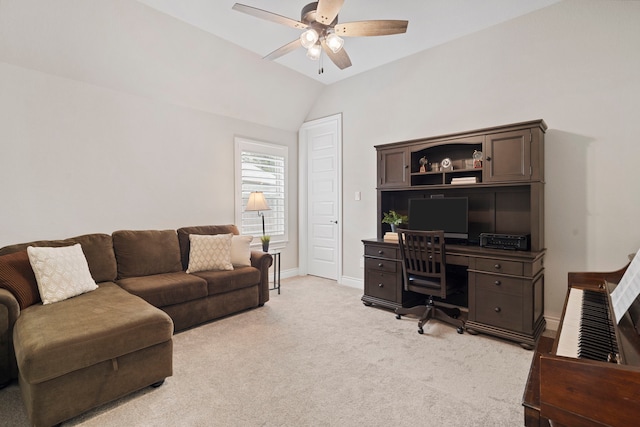 office space featuring ceiling fan, lofted ceiling, and light carpet