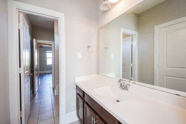 bathroom featuring tile patterned flooring and vanity