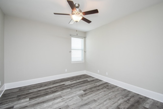 unfurnished room with hardwood / wood-style floors and ceiling fan