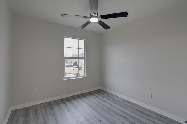 unfurnished room with light hardwood / wood-style flooring and ceiling fan