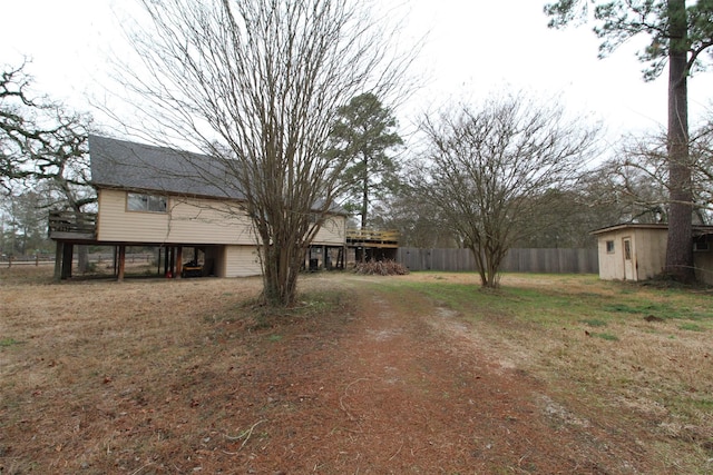 view of yard featuring a wooden deck