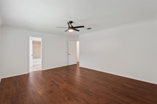 spare room featuring hardwood / wood-style flooring, ceiling fan, ornamental molding, and a textured ceiling