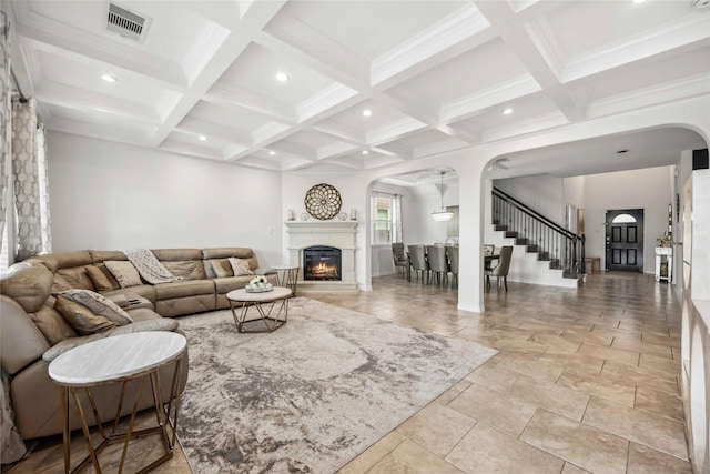 living room featuring recessed lighting, coffered ceiling, visible vents, stairs, and beamed ceiling