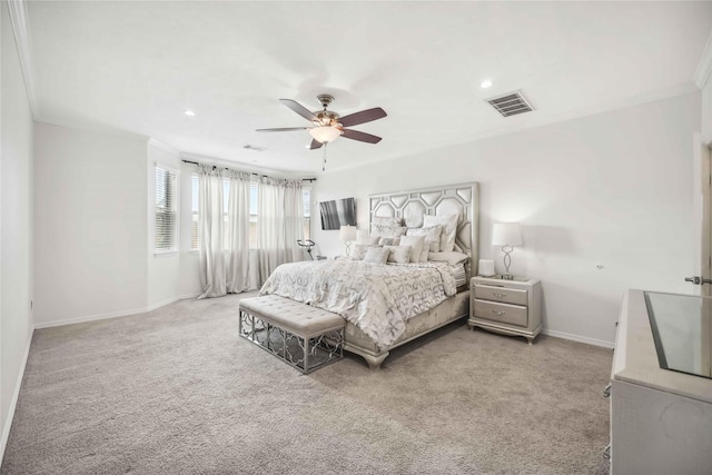 bedroom with light colored carpet, visible vents, ornamental molding, a ceiling fan, and baseboards