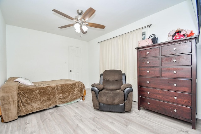 bedroom featuring ceiling fan and light hardwood / wood-style floors