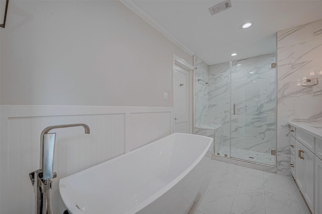 bathroom featuring crown molding, vanity, and plus walk in shower