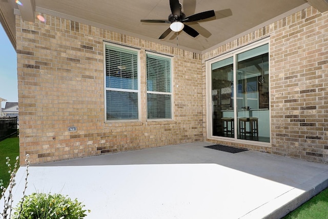 view of patio with ceiling fan