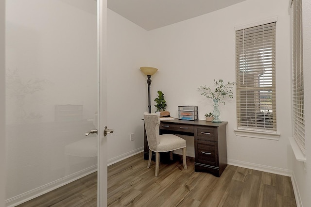 office area with light wood-type flooring