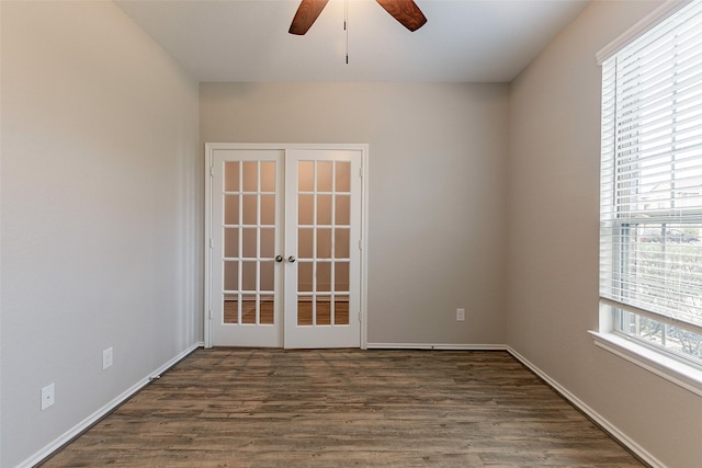 unfurnished room featuring dark wood-type flooring, french doors, and ceiling fan