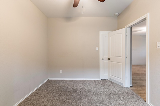 empty room featuring carpet and ceiling fan