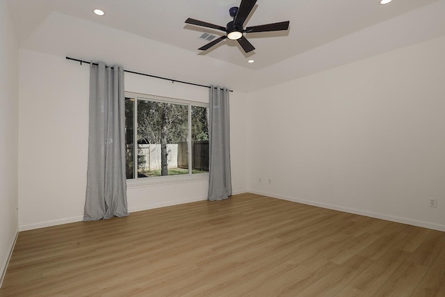 unfurnished room with ceiling fan and light hardwood / wood-style flooring