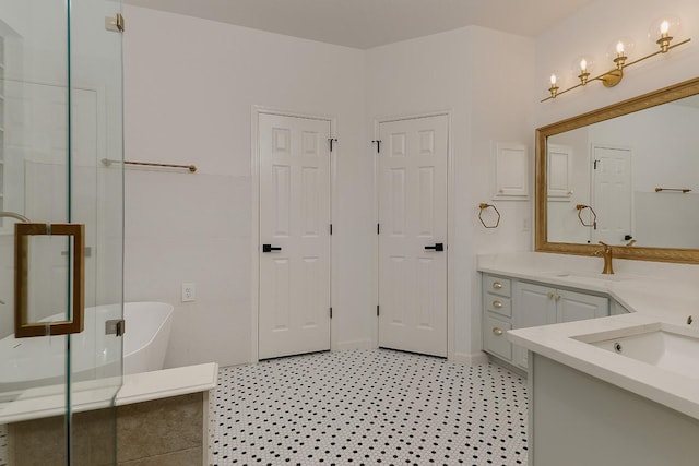 bathroom with a bathing tub and vanity