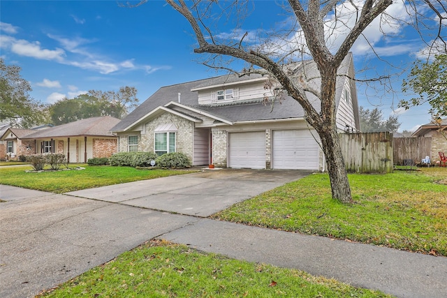 view of front of home with a garage and a front yard