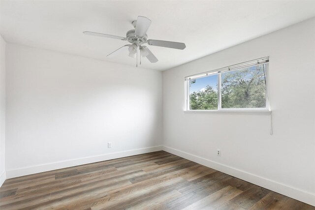 unfurnished room featuring hardwood / wood-style flooring and ceiling fan