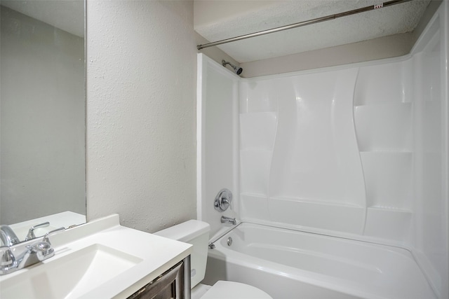 full bathroom with vanity,  shower combination, and toilet