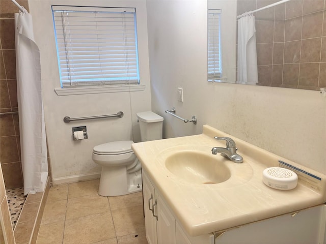 bathroom featuring vanity, tile patterned floors, toilet, and a shower with shower curtain