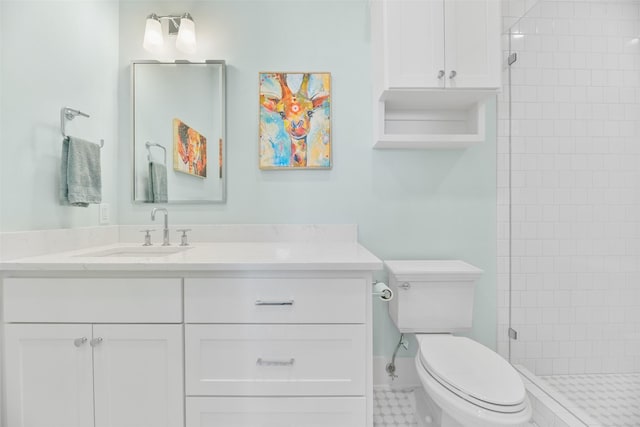 bathroom with vanity, toilet, a shower with shower door, and tile patterned flooring