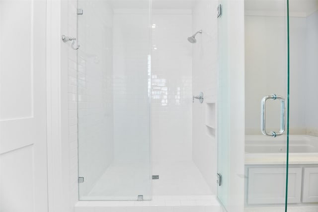 bathroom with an enclosed shower