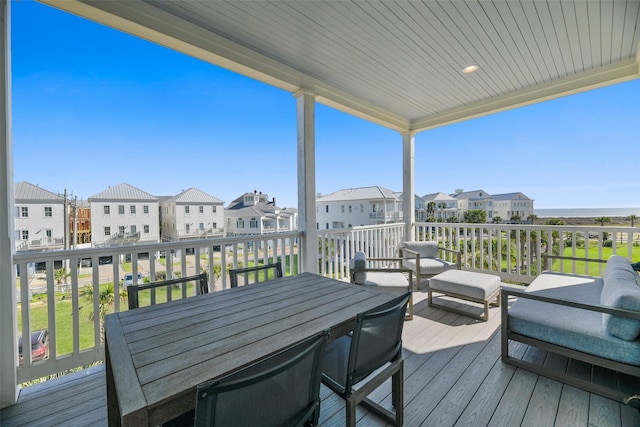 deck with an outdoor hangout area