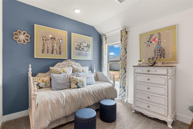 bedroom featuring access to exterior, vaulted ceiling, and carpet